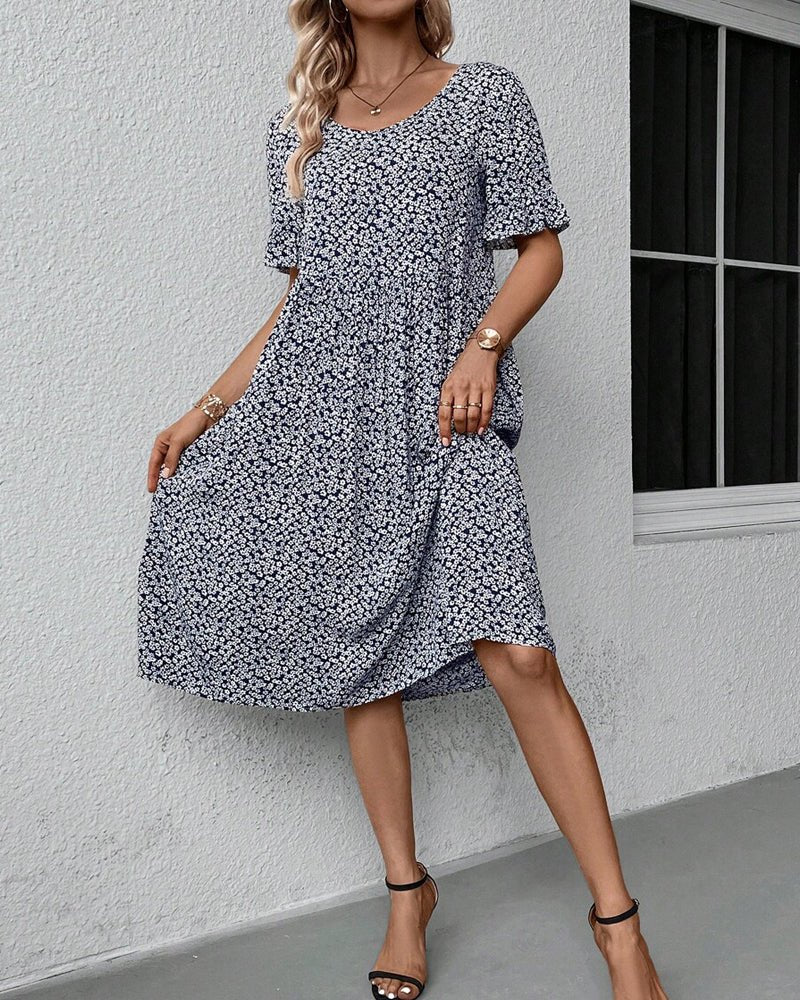 Maja | Midi Klänning i Blommigt Mönster, Blå