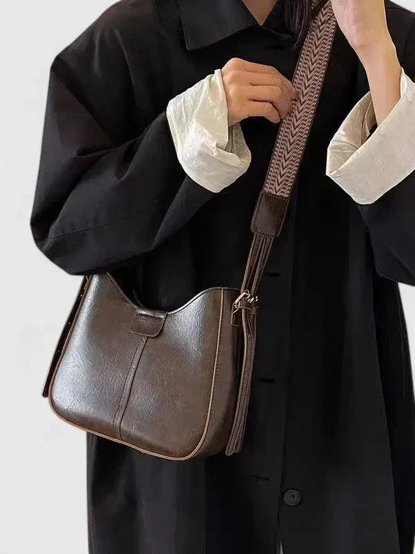 Wilma | Elegant axelväska i svart läder med justerbar rem