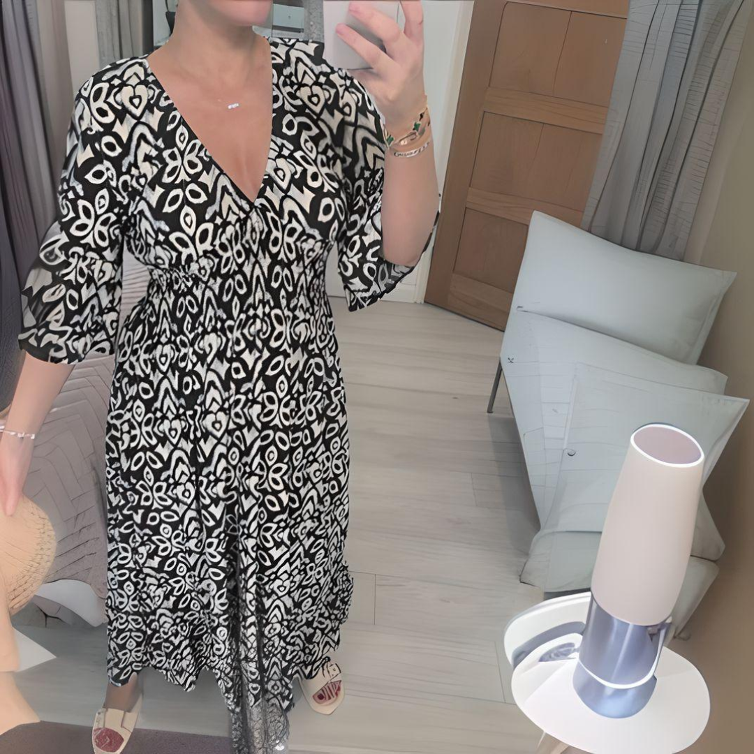 Elsa | flödande boho-klänning i viskös material, svart