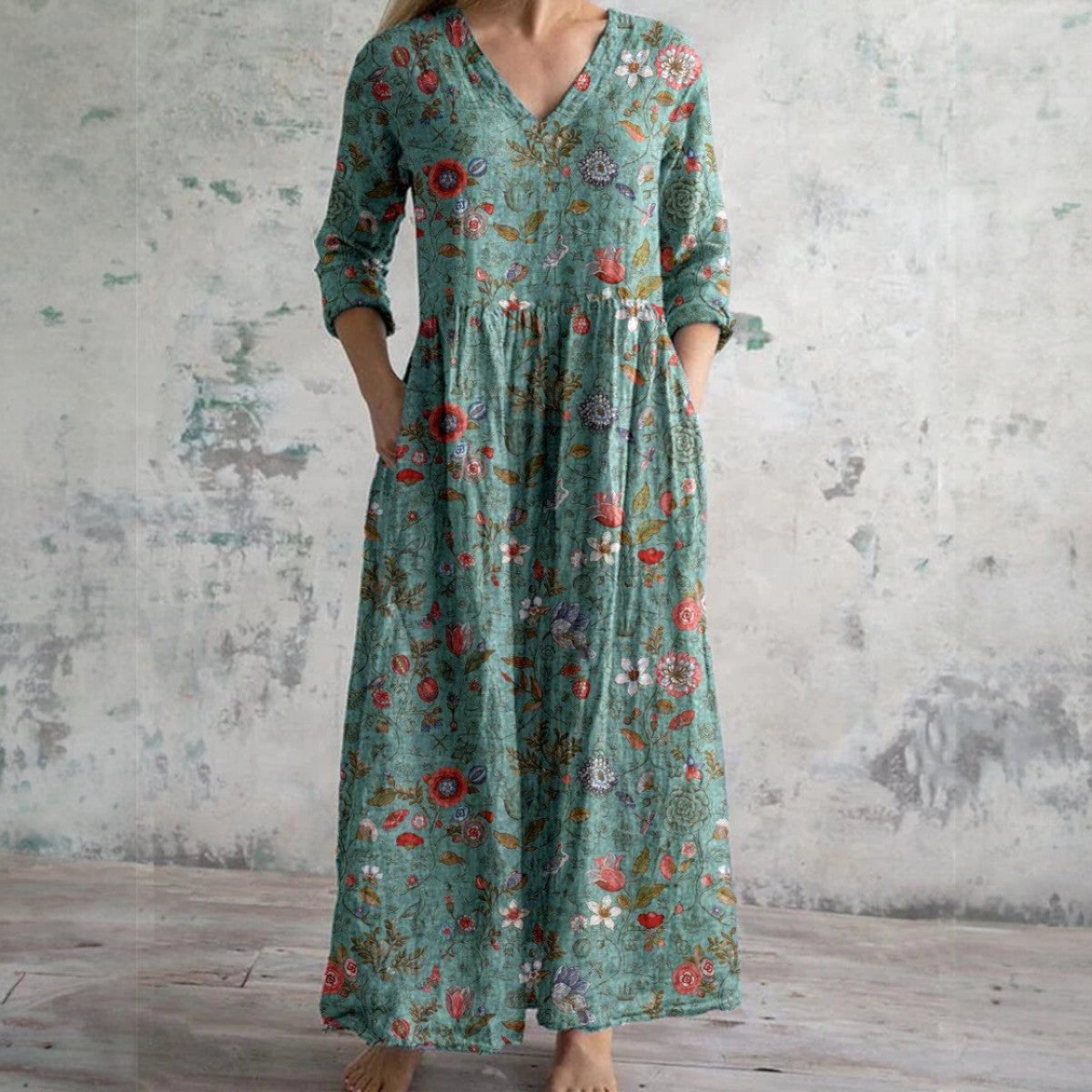 Tyra | grön klänning med halvlång ärm och blommönster